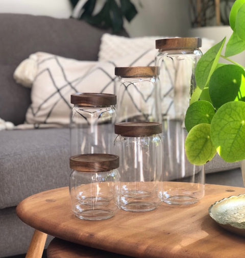 Kitchen glass storage jars with wooden lids