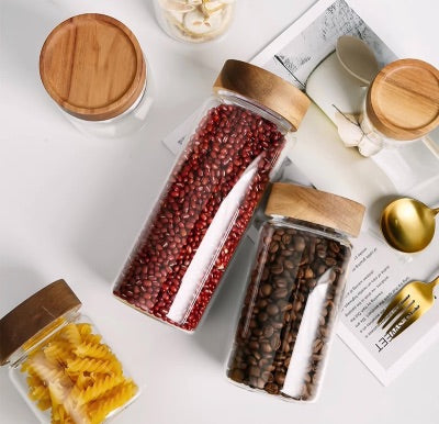 Clear glass jars with wood screw-top lids