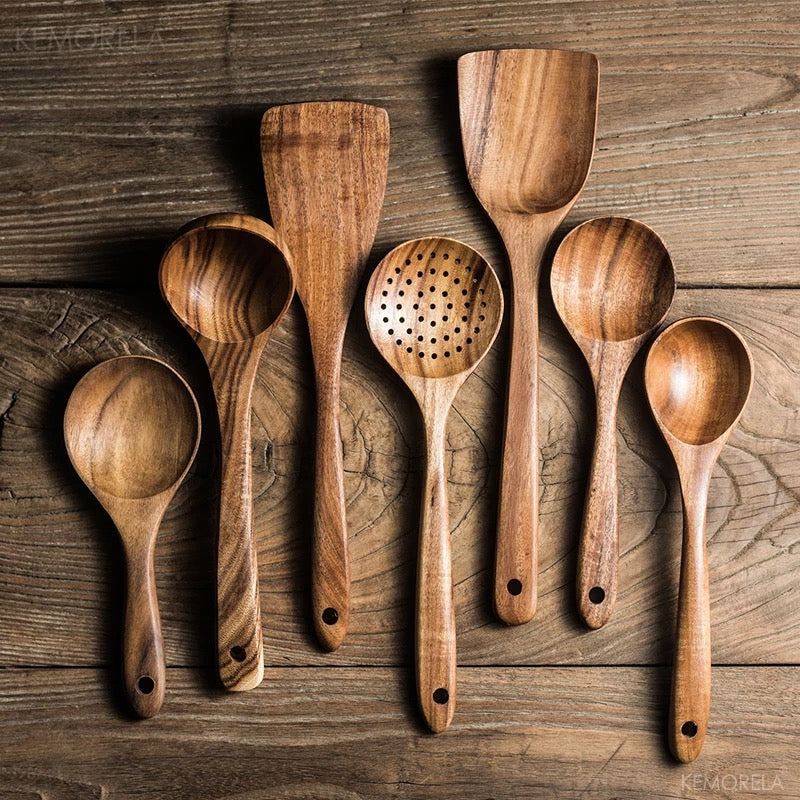 set of different wooden cooking utensils