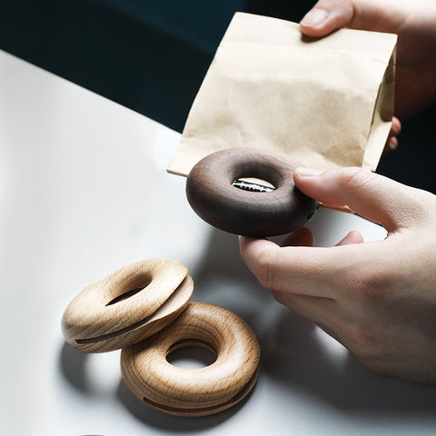 Wood bag-sealing clips