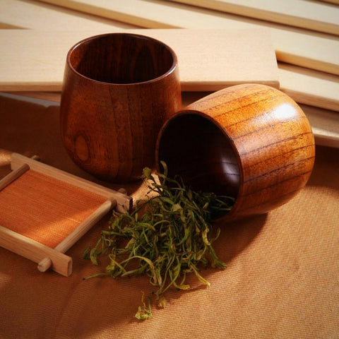 Small juice and ingredient cups made of wood