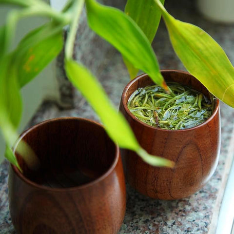 Cups without handles carved from solid wood