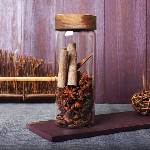 Large glass jars with screw on lids made of wood