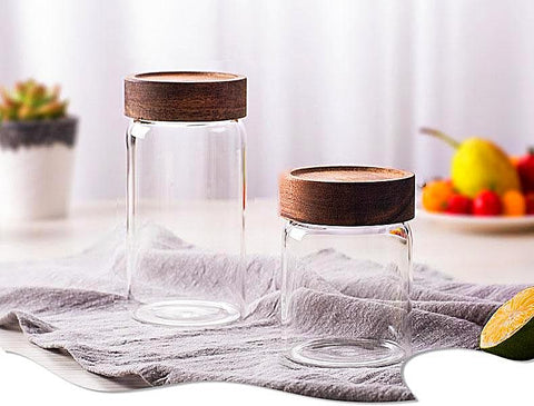 Modern sleek kitchen jars with wood lids