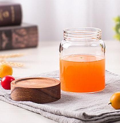 Stylish glass jars with air-tight wood lids