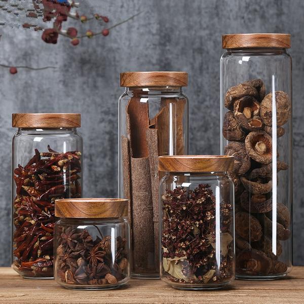 Glass kitchen storage jars with acacia wood lids