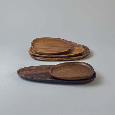 Set of different sized wooden platters