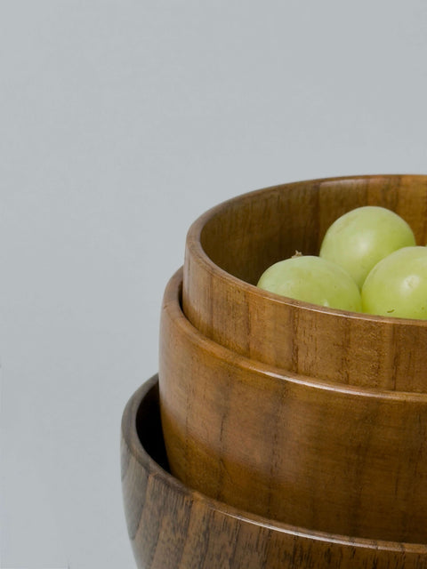 Finely crafted stackable wooden bowls in small, medium and large sizes