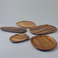 Acacia wood platters of different sizes, 5 piece set of wooden trays