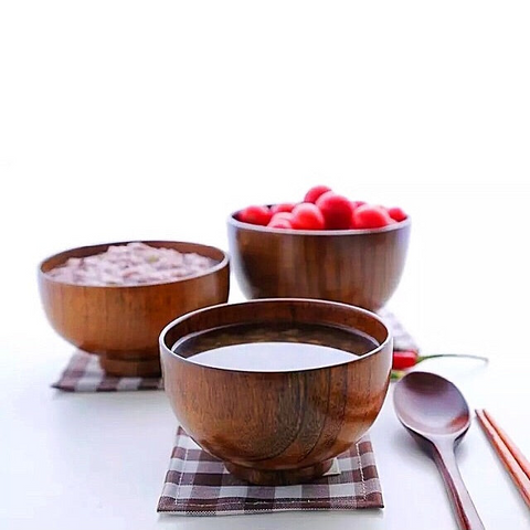 Wooden bowls, plates and spoons