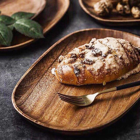 small and large wooden plates for food