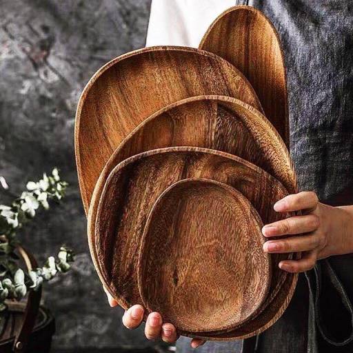 set of wood charger plates and platters