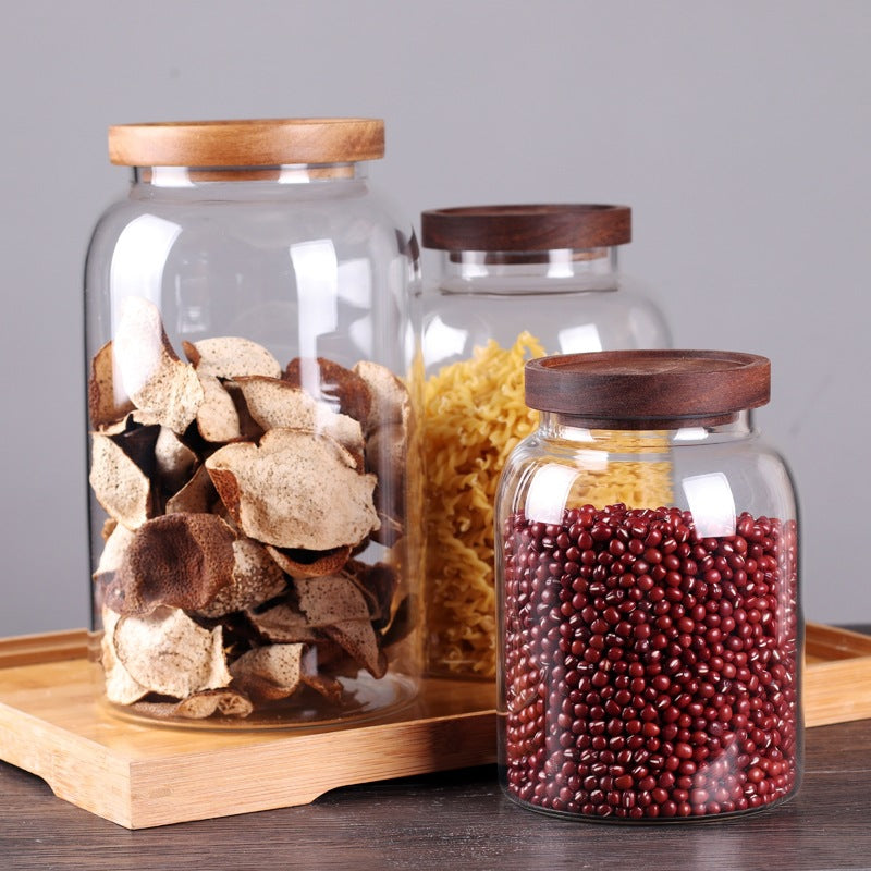 large gallon jars with wooden lids